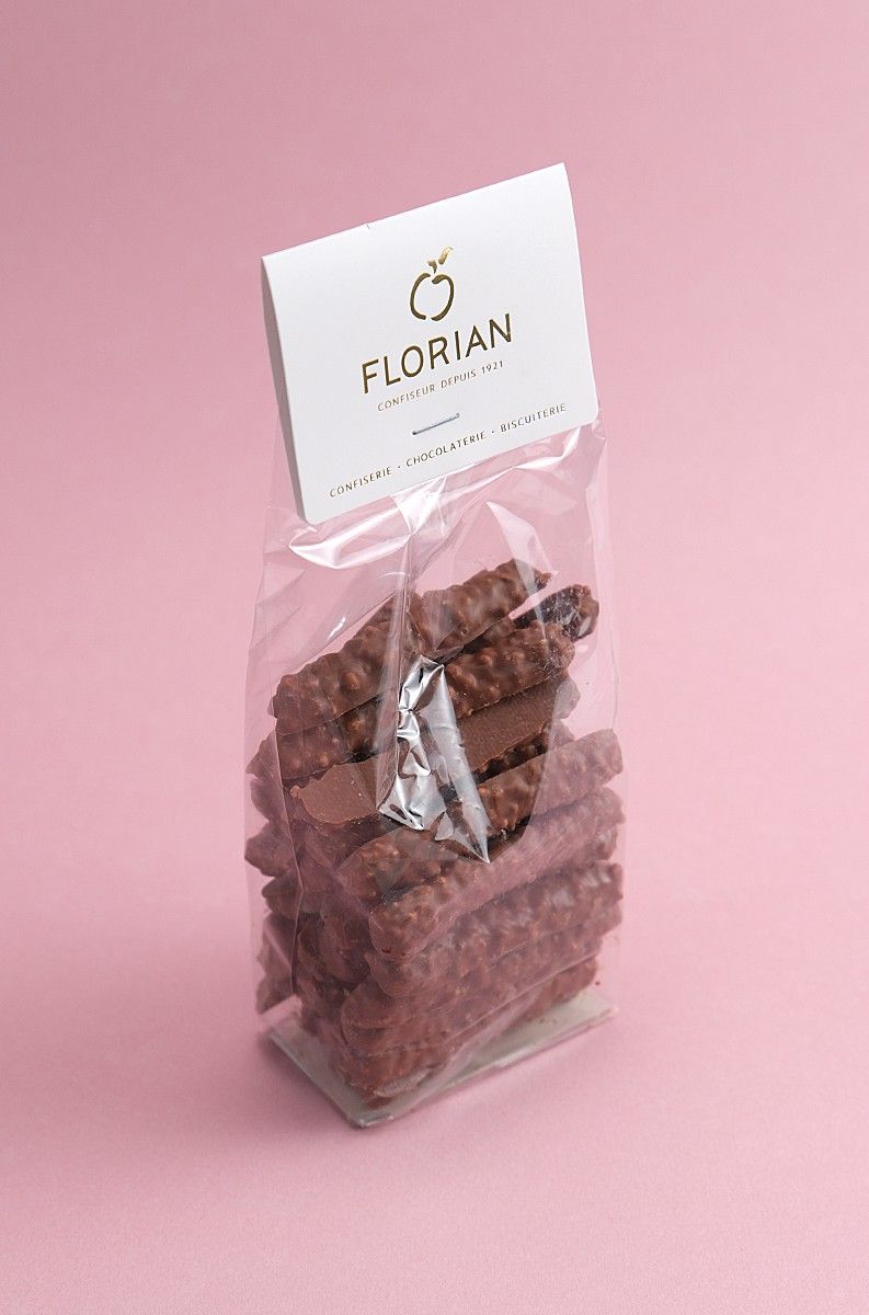 milk chocolate orangettes with hazelnut glaze by Confiserie Florian